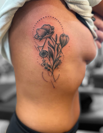 Explore black and grey tattoo filler ideas, creative tattoo ideas in Uniontown, available at Lace and Dagger Tattoo Company