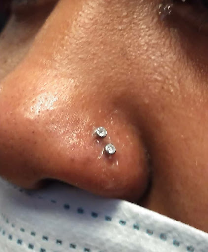 Explore flower garden tattoo ideas, creative tattoo ideas in Raleigh, available at The Room Body Piercing Studio