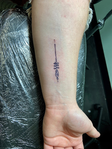 Explore mass effect tattoo ideas, creative tattoo ideas in Meridian, available at Creative Pain Tattoo Studio