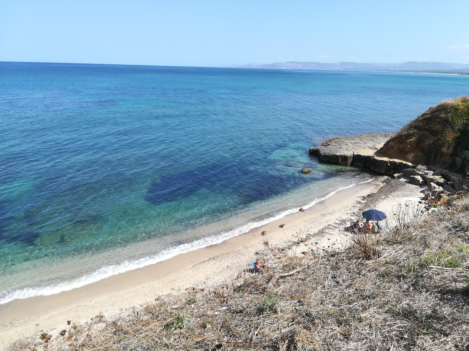 Fotografija Spiaggia di Farrizza z turkizna čista voda površino