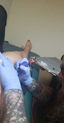 Explore chest and sleeve tattoo ideas, creative tattoo ideas in Cedar Falls, available at Omega Red Piercing & Tattoo