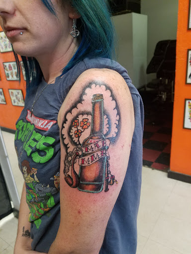 Explore leather tattoo ideas, creative tattoo ideas in Williamston, available at Lucky Tiger Tattoo studio