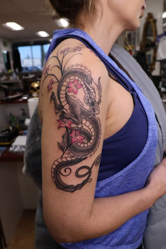 Explore fine line spine tattoo ideas, creative tattoo ideas in Fresno, available at Grizzly Tattoo Studio
