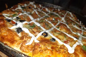 One Bite Pizza And Grill image