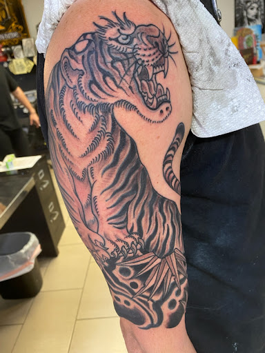 Explore brother memorial tattoo ideas, creative tattoo ideas in Sarasota, available at SEVEN SINS Tattoo Studio