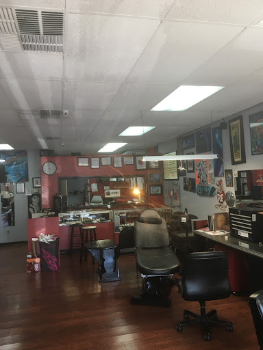Explore afro tattoo ideas, creative tattoo ideas in Largo, available at Alchemy Tattoos and Body Piercings