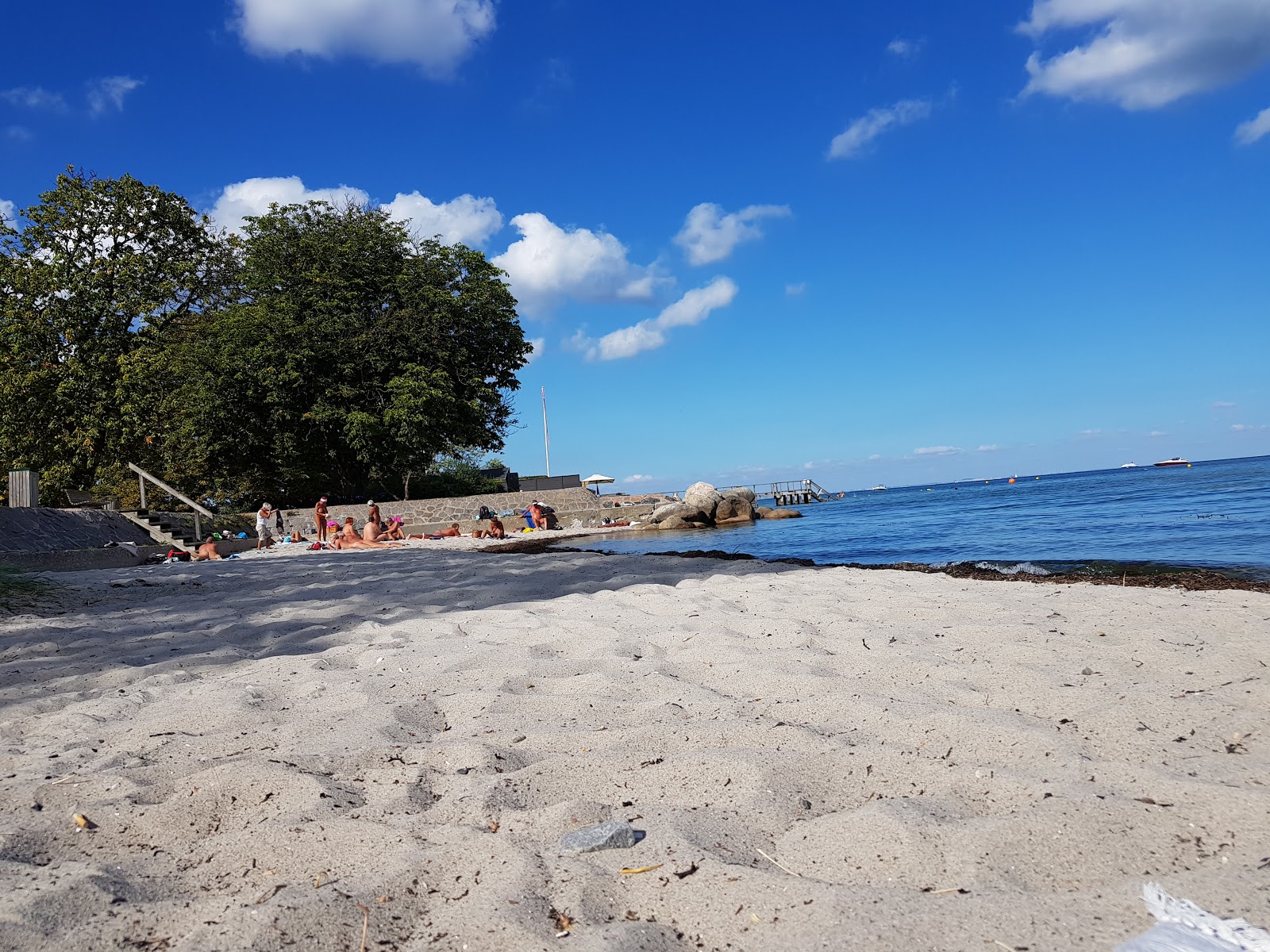 Photo de Strandlund nudist Beach avec l'eau cristalline de surface