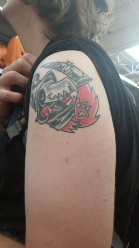 Explore melanoma tattoo ideas, creative tattoo ideas in Saint Louis, available at Iron Age Studios