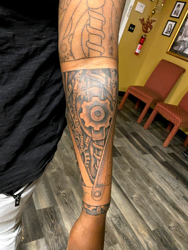 Explore massage therapist tattoo ideas, creative tattoo ideas in Warner Robins, available at Untold Pain Tattoo Studio