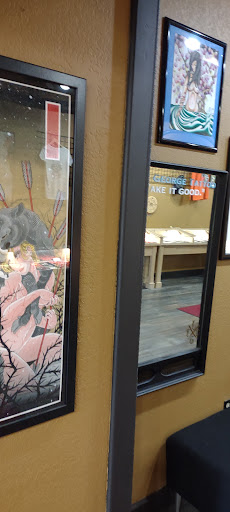 Explore leg flower tattoo ideas, creative tattoo ideas in Lake George, available at Lake George Tattoo Company