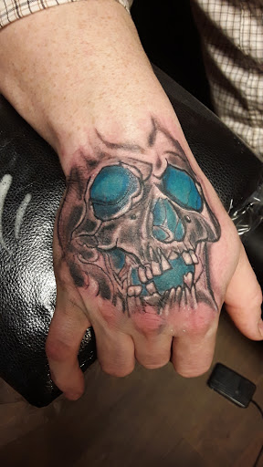 Explore cool forearm tattoo ideas for guys, creative tattoo ideas in Cumberland, available at Queen City Ink