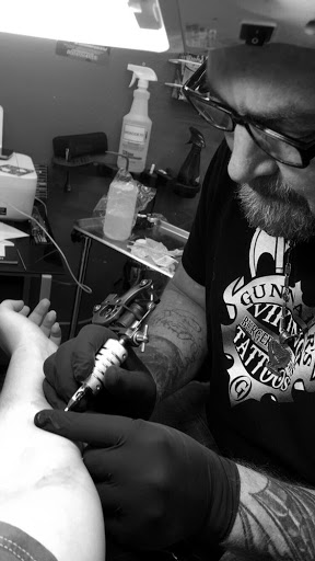 Explore small dog tattoo ideas, creative tattoo ideas in Daytona Beach, available at Studio 21 Tattoo & Piercings Daytona Beach