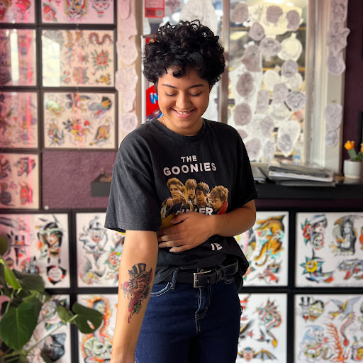 Explore rose thigh tattoo ideas, creative tattoo ideas in Georgetown, available at Iron Rite Tattoo South