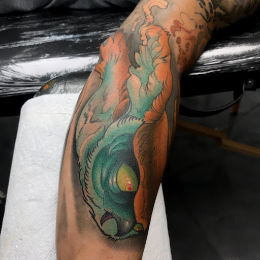 Explore rapper tattoo ideas, creative tattoo ideas in Tallmadge, available at Killjoy tattoo