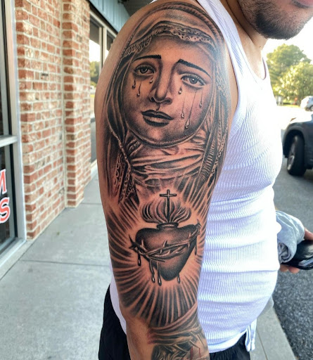 Explore atlas tattoo ideas, creative tattoo ideas in Rehoboth Beach, available at Tattoo Galaxy (Rehoboth Beach) Piercing & Custom tattoos