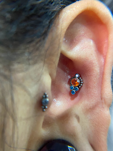 Explore elden ring tattoo ideas, creative tattoo ideas in Orange, available at Symbiosis Body Piercing