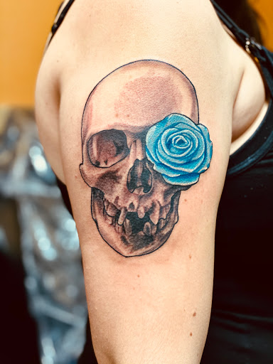 Explore bone tattoo ideas, creative tattoo ideas in Toledo, available at Steel Addictions
