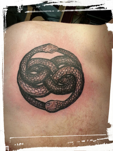 Explore country tattoo ideas for guys, creative tattoo ideas in La Crosse, available at La Crosse Tattoo