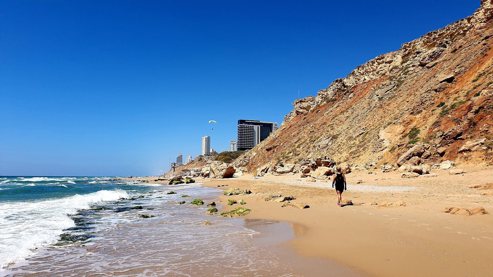 Photo of Argaman beach with turquoise pure water surface