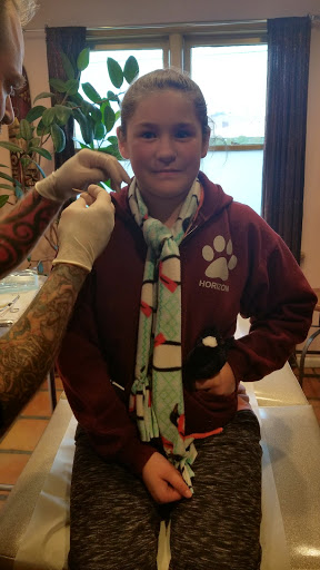 Explore calf tattoo ideas for men, creative tattoo ideas in Salt Lake City, available at KOI Piercing Studio