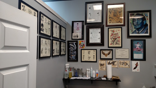 Tattoo Shop «Jolly Roger Tattoo», reviews and photos, 1375 Rock Quarry Rd #203, Stockbridge, GA 30281, USA