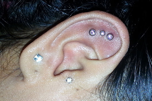 Explore baby tattoo ideas for mom, creative tattoo ideas in Wilmington, available at Wildcard Studios