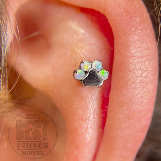 Find playboy bunny tattoo ideas for your next unique tattoo in Worcester at Elegance Piercing & Tattoo Inc.