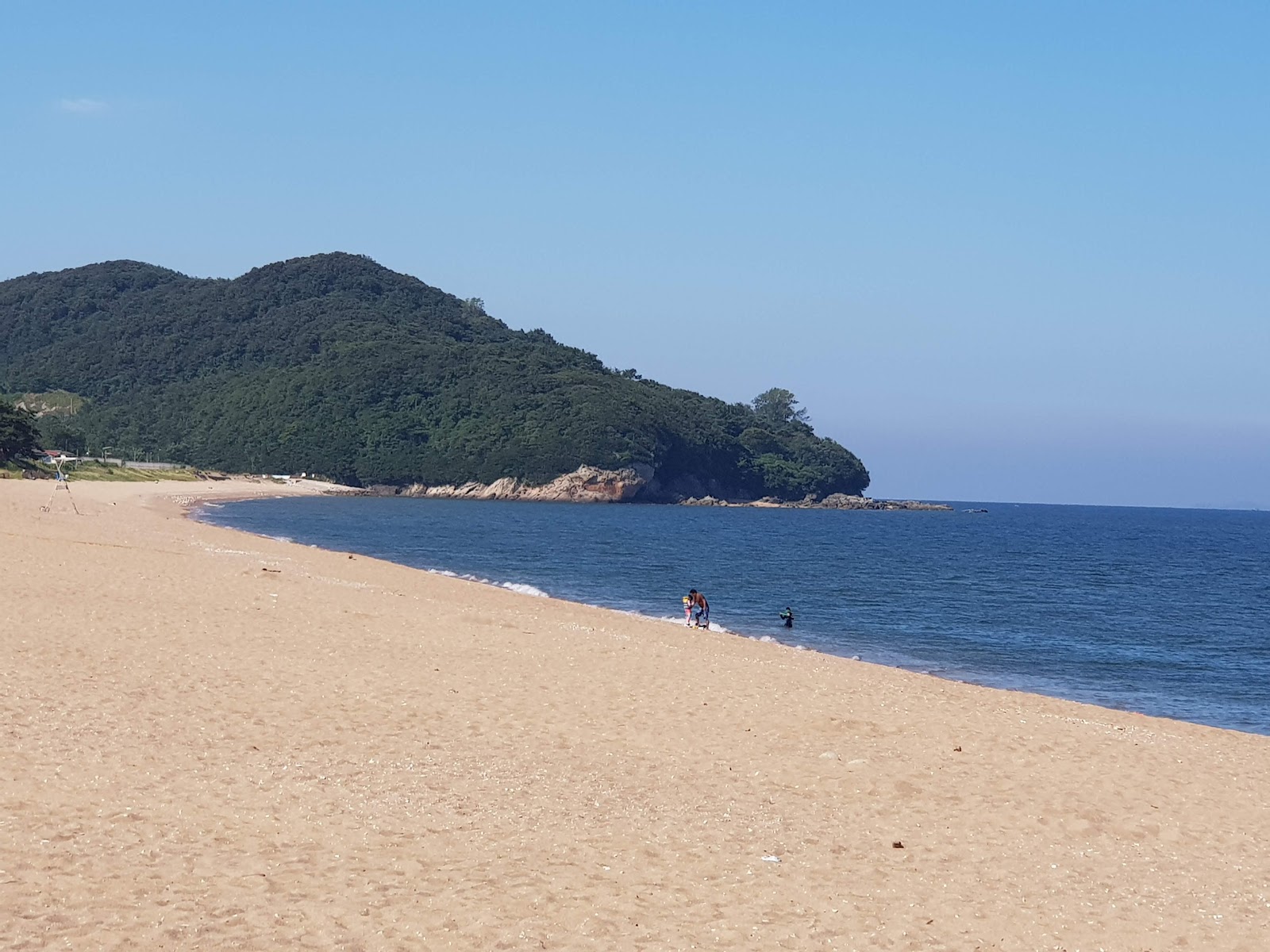 Φωτογραφία του Gosapo Beach με μπεζ άμμος επιφάνεια