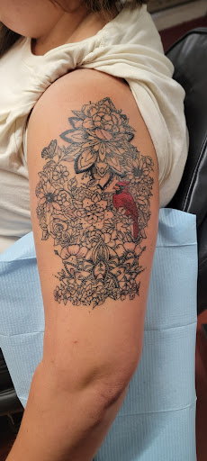 Explore floral sleeve tattoo ideas, creative tattoo ideas in Dripping Springs, available at Hill Country Arts Piercings And Tattoos