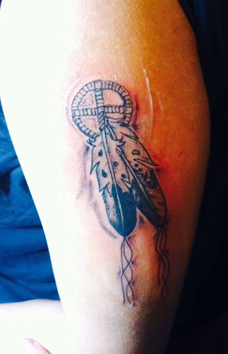 Explore tattoo ideas for 50th birthday, creative tattoo ideas in Rapid City, available at Phuzion Storm Tattoo Shop