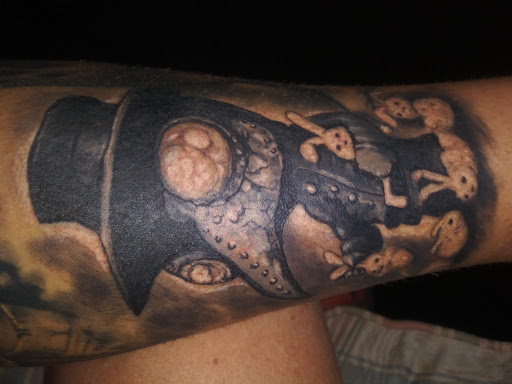 Explore totem pole tattoo ideas, creative tattoo ideas in Bardstown, available at Artistic Resurrection Tattoo Bardstown