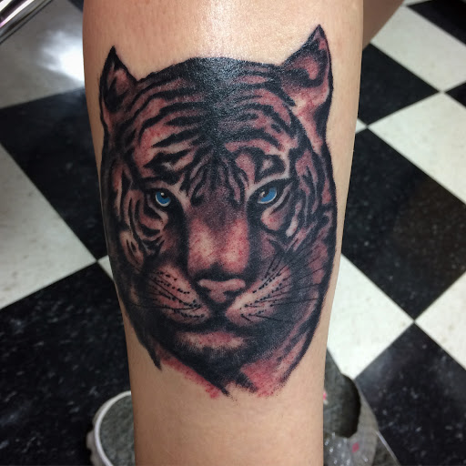 Explore star tattoo ideas for females, creative tattoo ideas in Black River Falls, available at Black River Tattoo