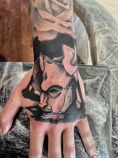 Find tattoo ideas for mom for your next unique tattoo in Rogers at Ink Solutions Tattoo