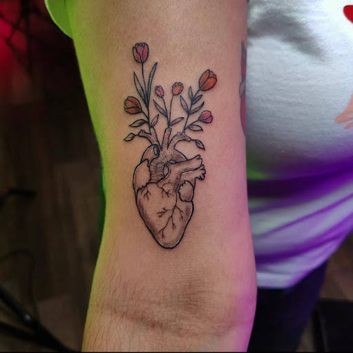 Explore great shoulder tattoo ideas, creative tattoo ideas in Clarksville, available at Dark Raine Tattoo