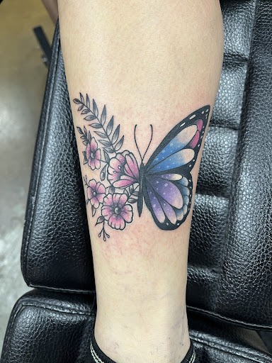 Explore ovarian cancer tattoo ideas, creative tattoo ideas in Smithfield, available at Combine Mindz Tattoo Production LLC