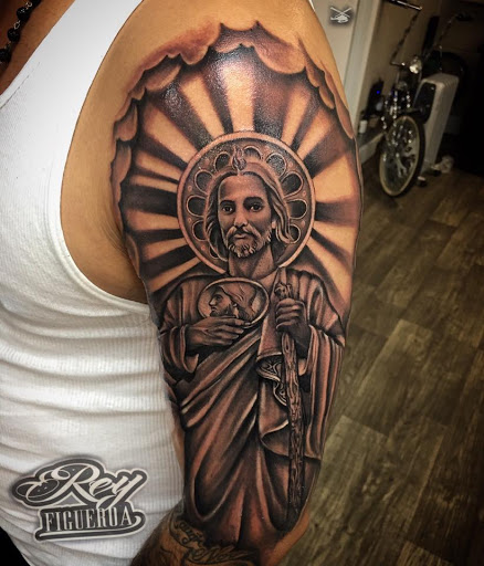 Explore bald head tattoo ideas, creative tattoo ideas in Marietta, available at Royal Ink Studio