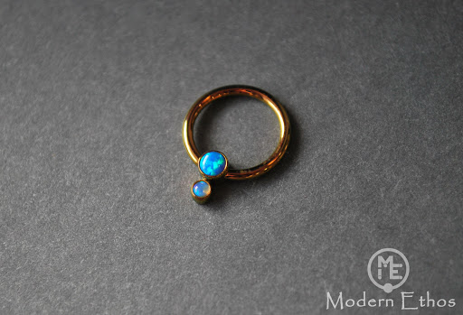 Explore wrestling tattoo ideas, creative tattoo ideas in New Cumberland, available at Modern Ethos Piercing