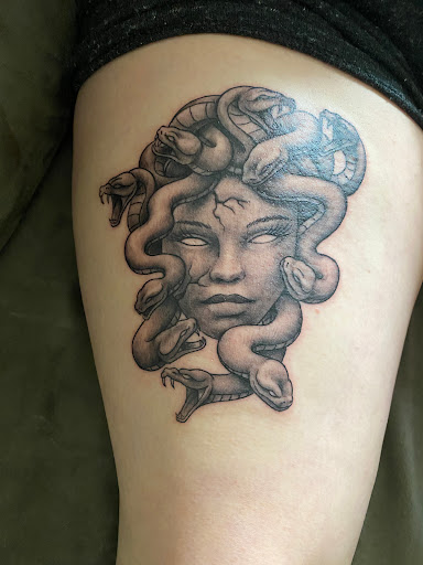 Explore toy story tattoo ideas, creative tattoo ideas in Whitehall, available at Legion Tattoo Gallery