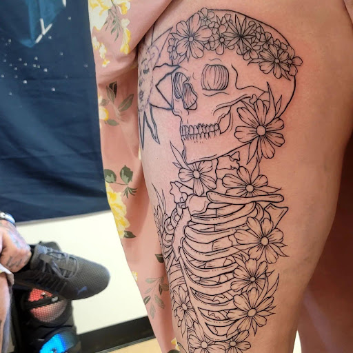 Explore dark hand tattoo ideas, creative tattoo ideas in Marietta, available at Monkeys Uncle Tattoo