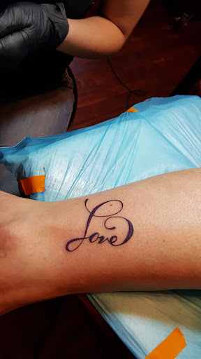 Explore small wrist tattoo cover up ideas, creative tattoo ideas in Woodward, available at Paper Street Tattoo Company