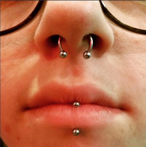 Explore medium tattoo ideas for men, creative tattoo ideas in Houston, available at Biolab Fine Jewelry and Body Piercing Studio