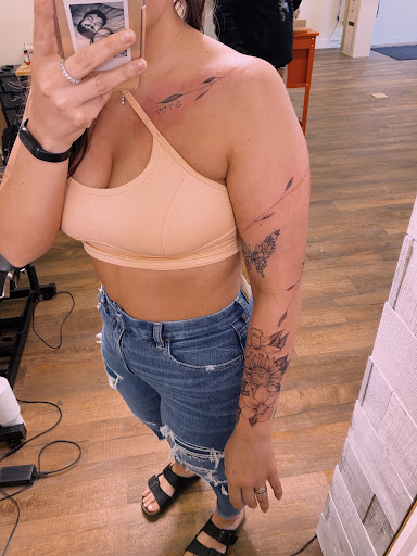 Explore butterfly leg tattoo ideas, creative tattoo ideas in New London, available at The Art of Ink Studio