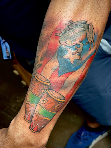 Explore slave tattoo ideas, creative tattoo ideas in Tampa, available at HAWKS ELECTRIC TATTOOS