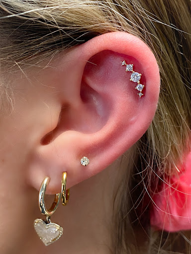 Explore tattoo cover up ideas for women, creative tattoo ideas in Springfield, available at Body Piercing By Qui Qui