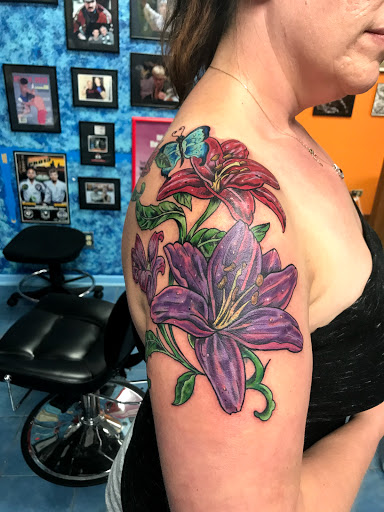 Explore rib tattoo ideas for men, creative tattoo ideas in Aurora, available at Ronin Tattoo Studio INC