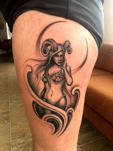 Explore man tattoo ideas arm, creative tattoo ideas in Columbus, available at Atlas Tattoo and Piercing Studio