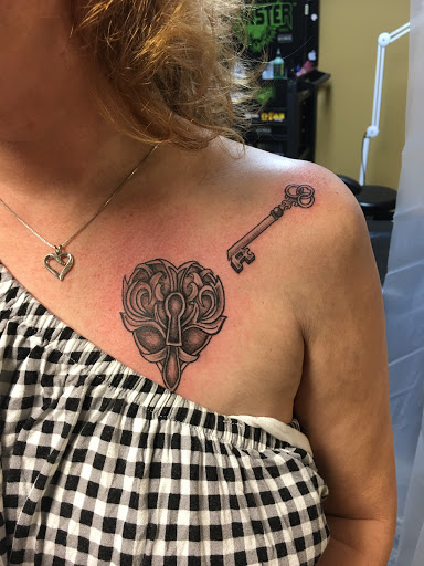 Explore men's ring tattoo ideas, creative tattoo ideas in Warner Robins, available at Untold Pain Tattoo Studio