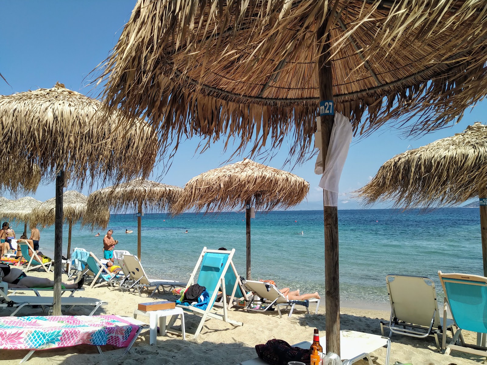 Tarsanas beach'in fotoğrafı turkuaz saf su yüzey ile