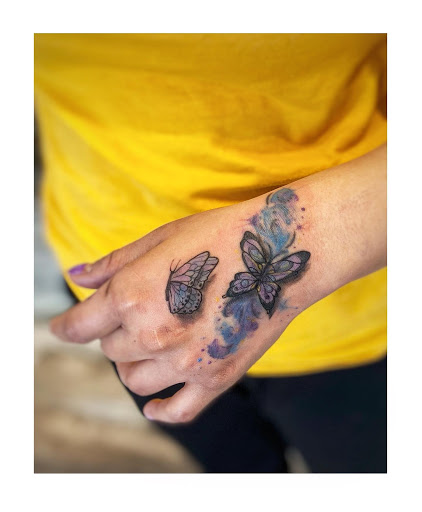 Explore lower back tattoo ideas, creative tattoo ideas in Moline, available at ARTIST AIMEE TATTOOS - AF Tattoo Studio