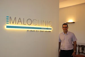 MALOCLINIC - מרפאת שיניים - דר' ערן פרמון-השתלות שיניים ביום אחד image